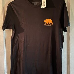 Ocean and Coast Black Tee with Orange Bear Logo
